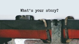 Close up of a typewriter with the words 'What your story?' written on the paper